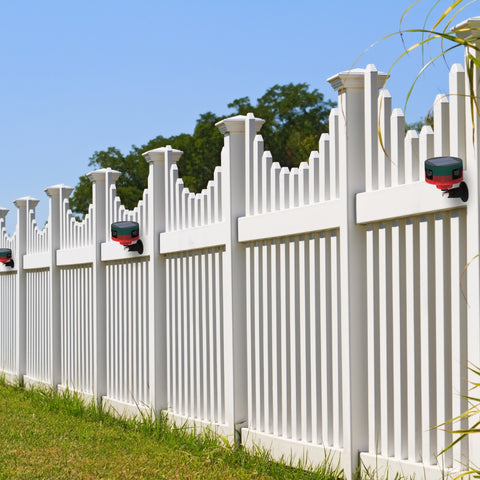motion detector strobe light, installed on a fence