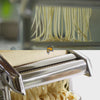 Image of pasta maker machine making fresh made pasta